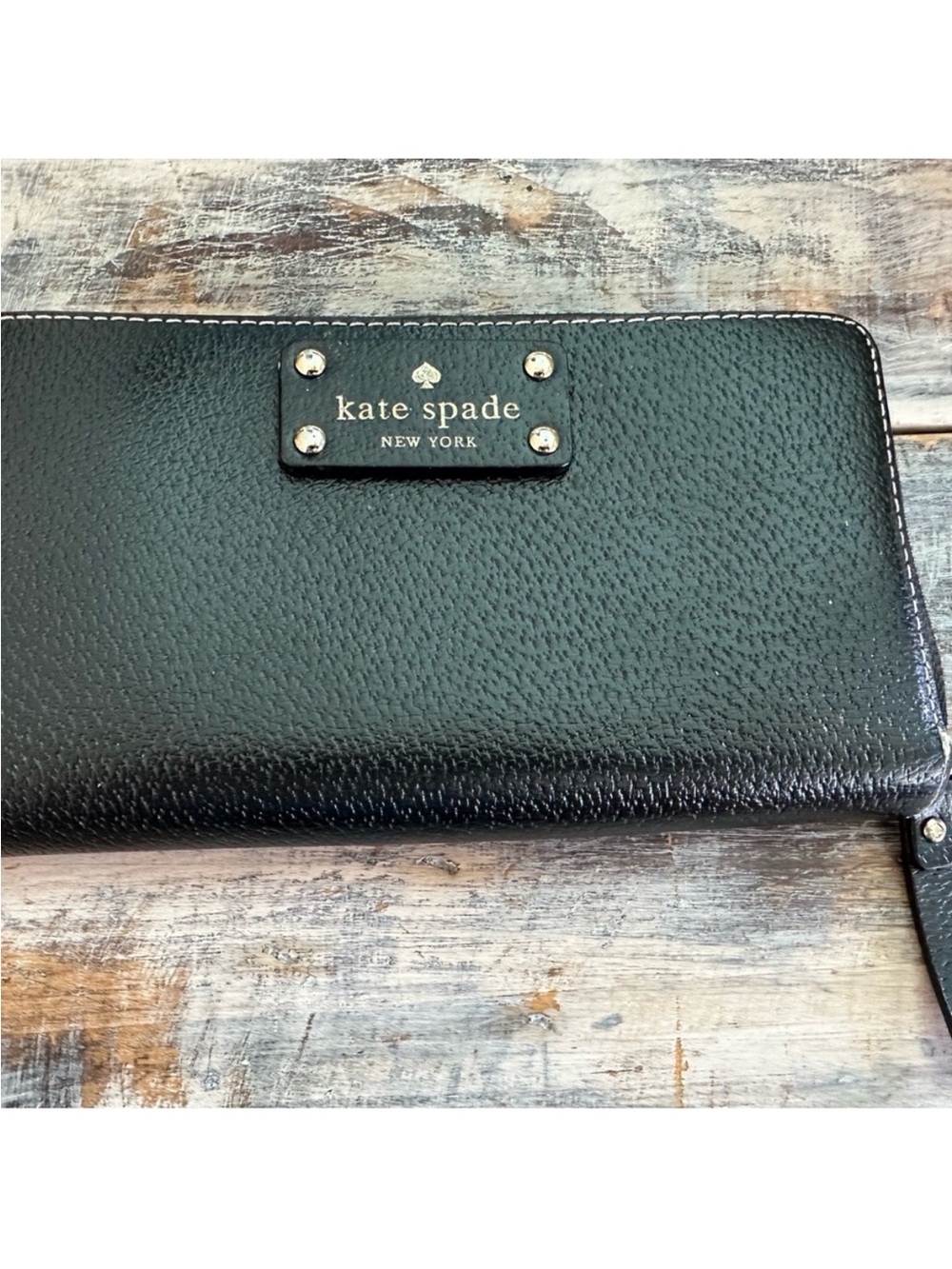 kate spade black pebbled leather zip-around wallet